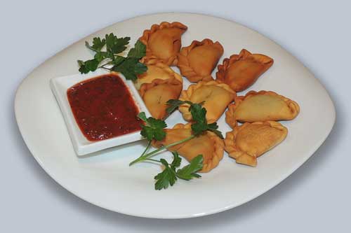 Вареники жареные